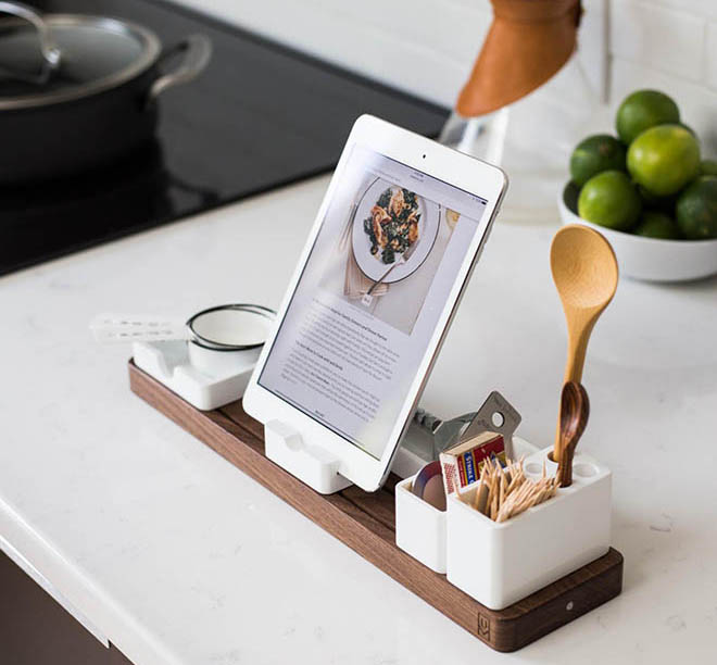 Millennials use mobile devices in the kitchen.